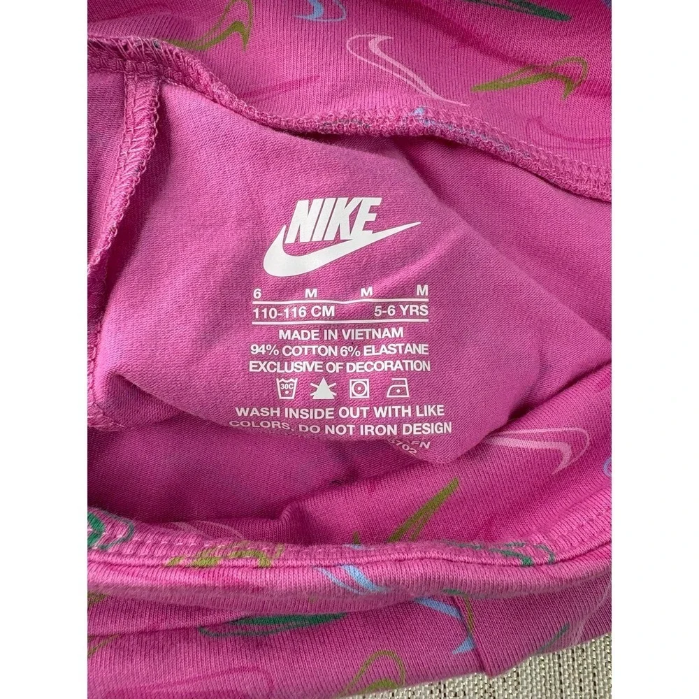 Three pairs of pink Nike biker shorts, size 6X and 6